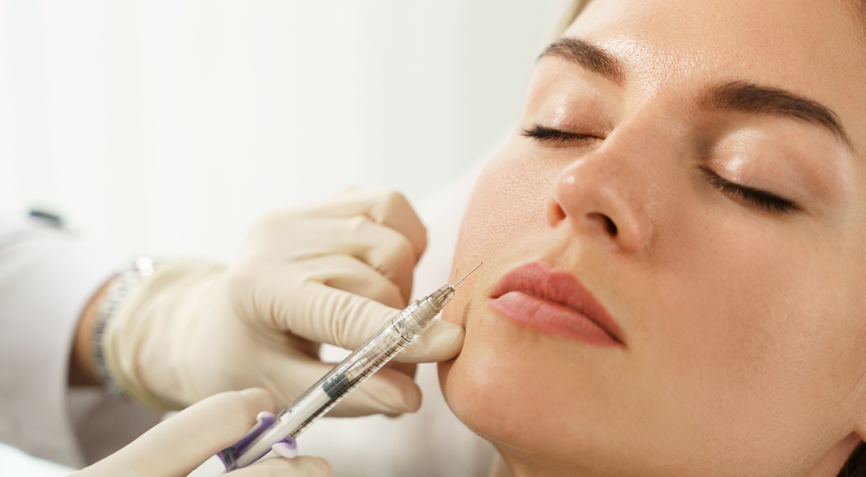 Photo of woman about to get lip filler injections