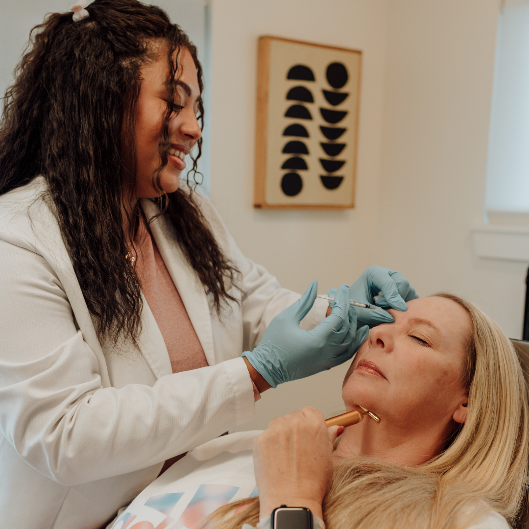 Nurse Mikayla of Aluma Aesthetic Medicine giving Botox injection to a patient.